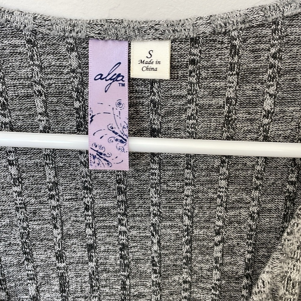 Super soft surplice top with a banded bottom hem and banded long sleeves. - Picture 3 of 4